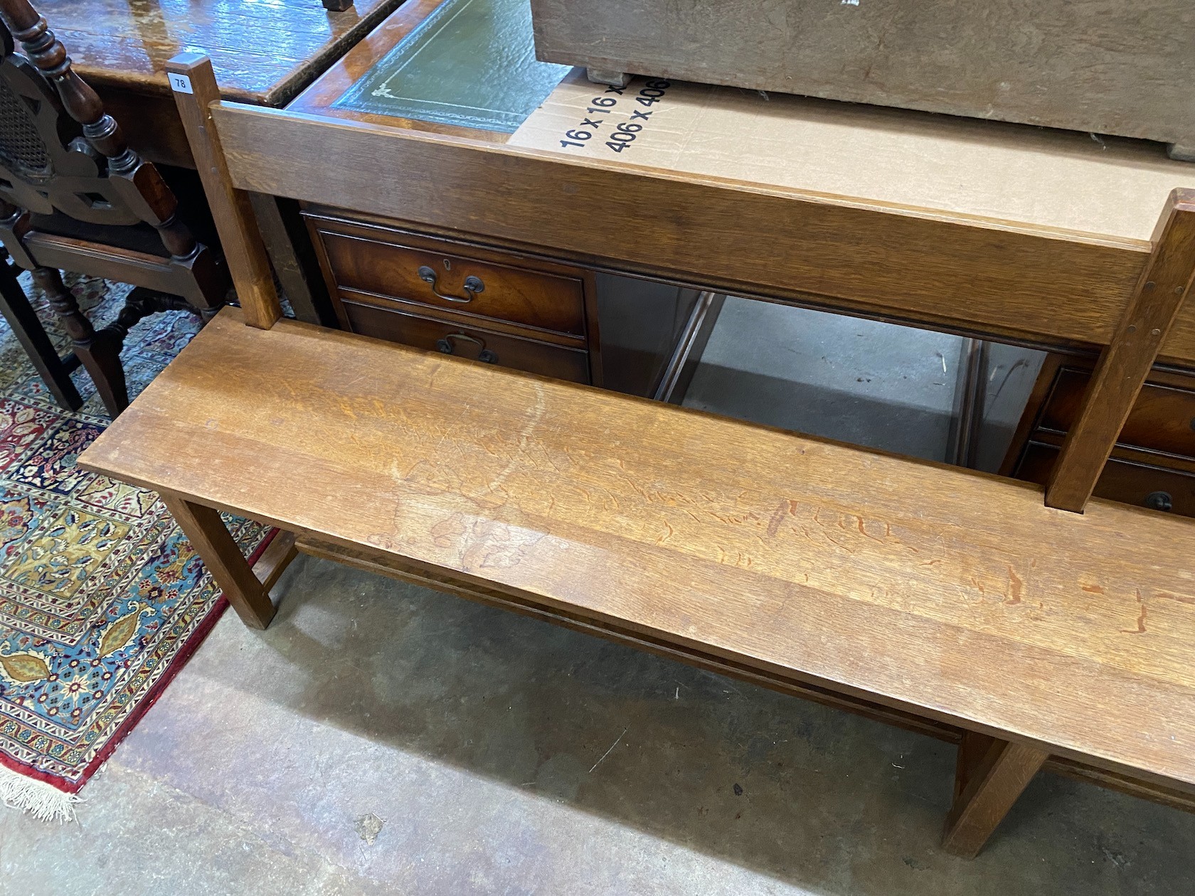 An early 20th century French oak chair back bench, length 250cm, depth 36cm, height 85cm